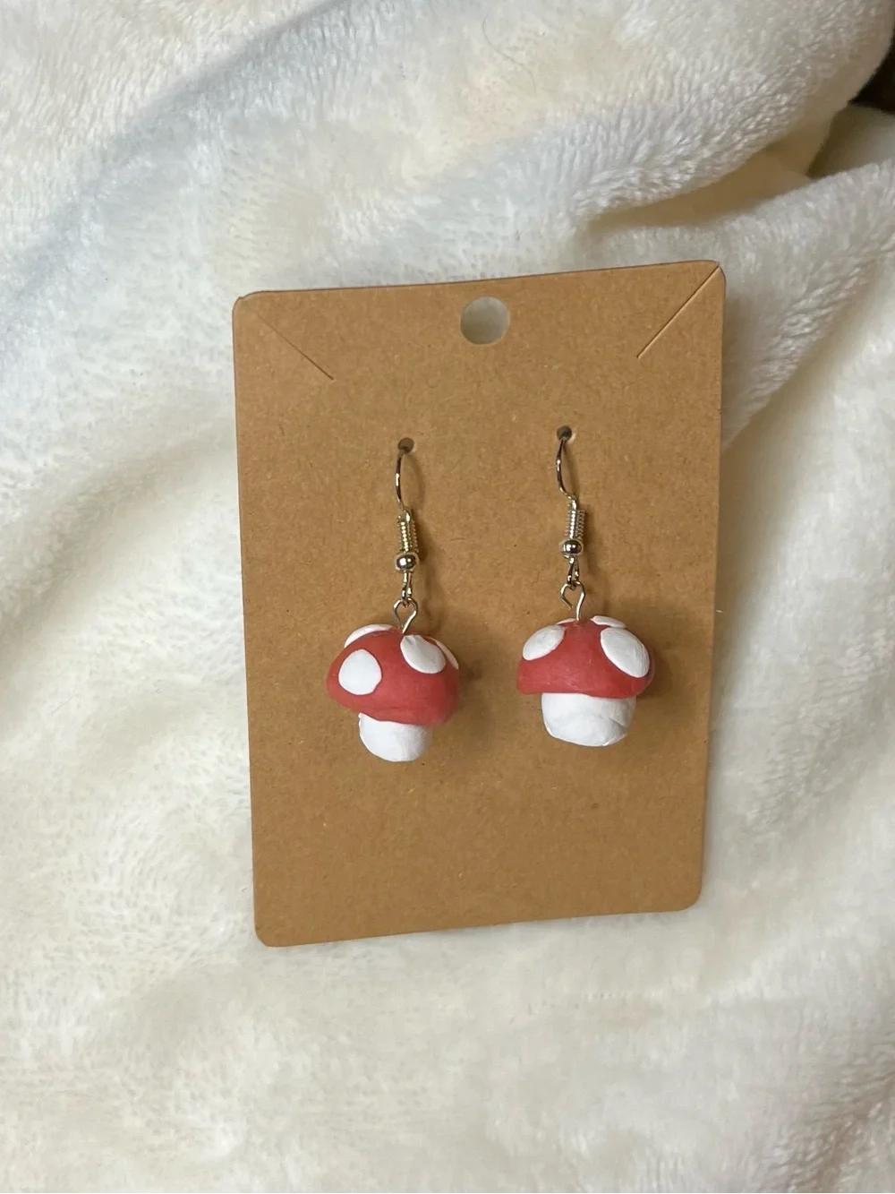 Super Mario-inspired Handcrafted mushroom dangle earrings.